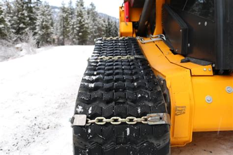 tracks or chains on skid steer|skid loader track chains.